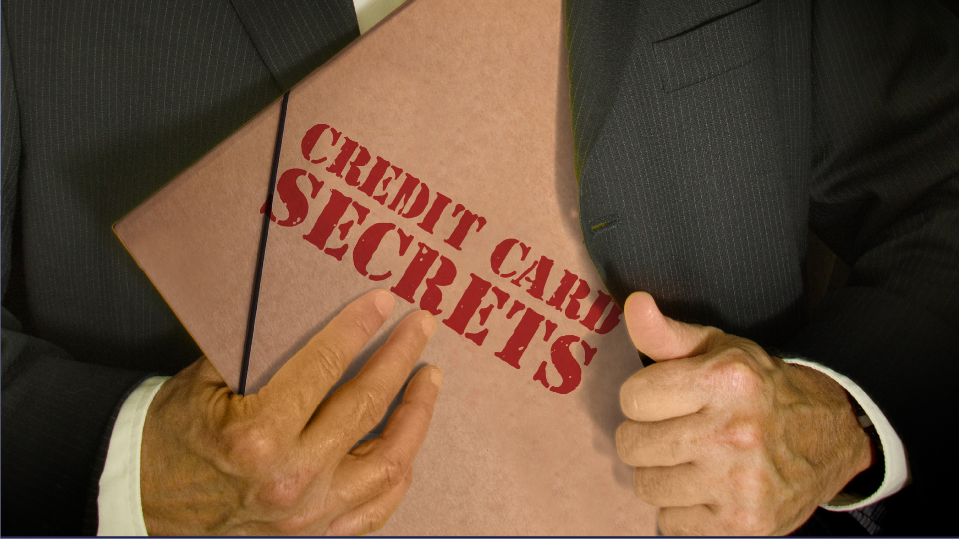 File folder of credit card secrets being slipped into an overcoat.