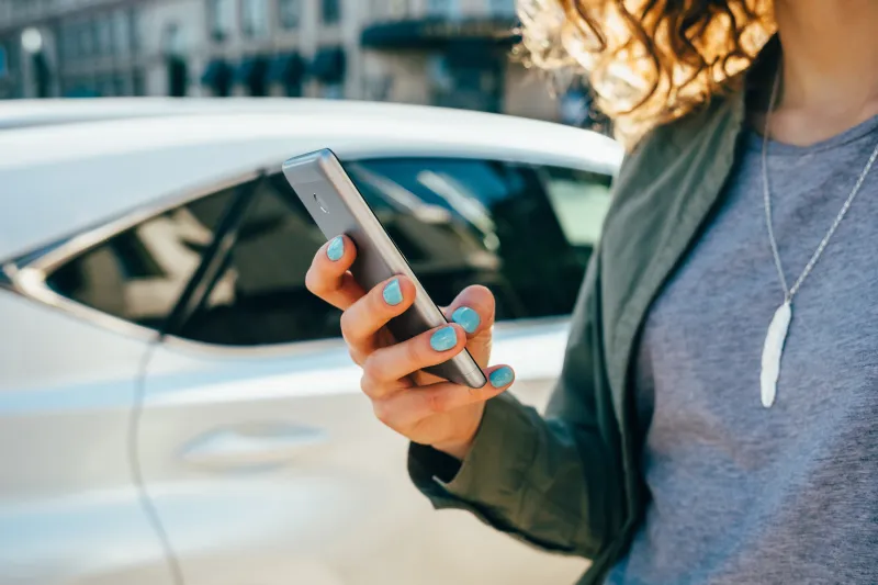 Woman Looking at Phone