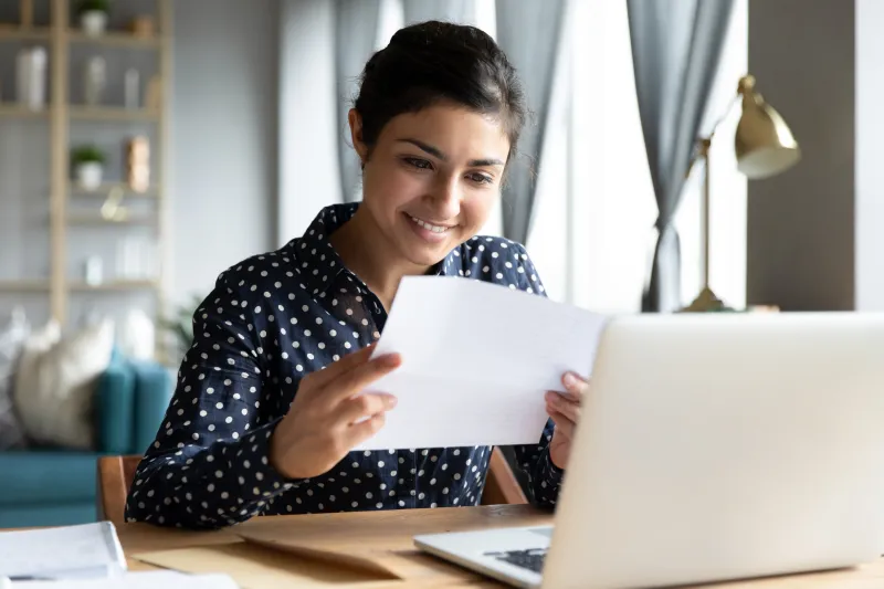 Woman Looking at Bank Account Statement
