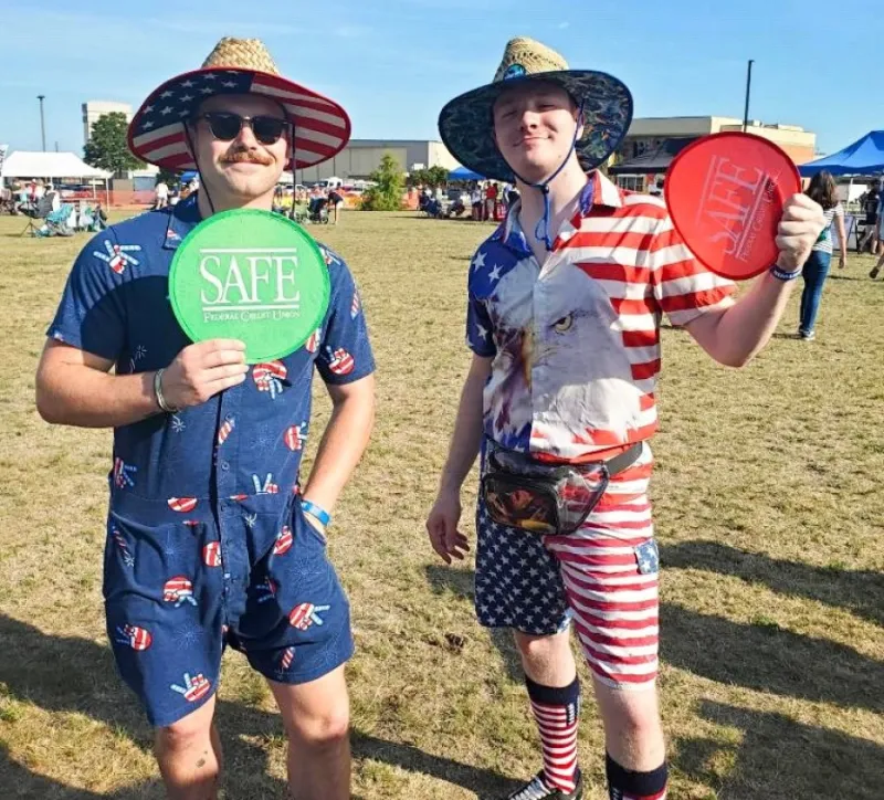Two men wearing patriotic outfits