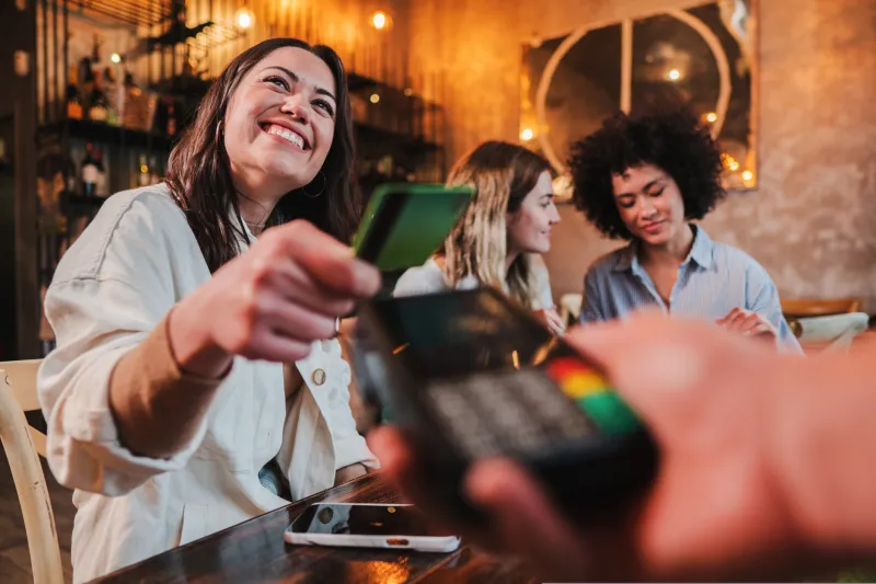 Woman Using Credit Card