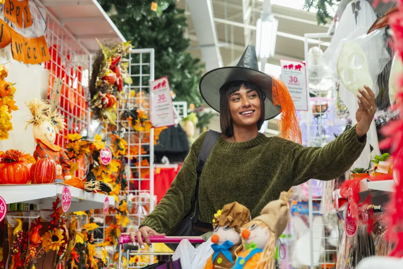 Woman shopping in the fall seasonal aisle