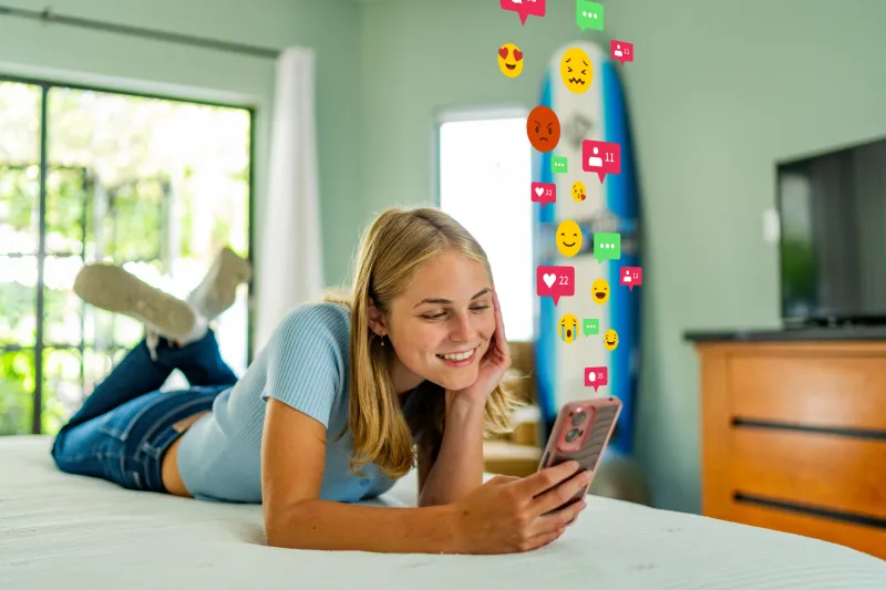 teen girl scrolling her phone