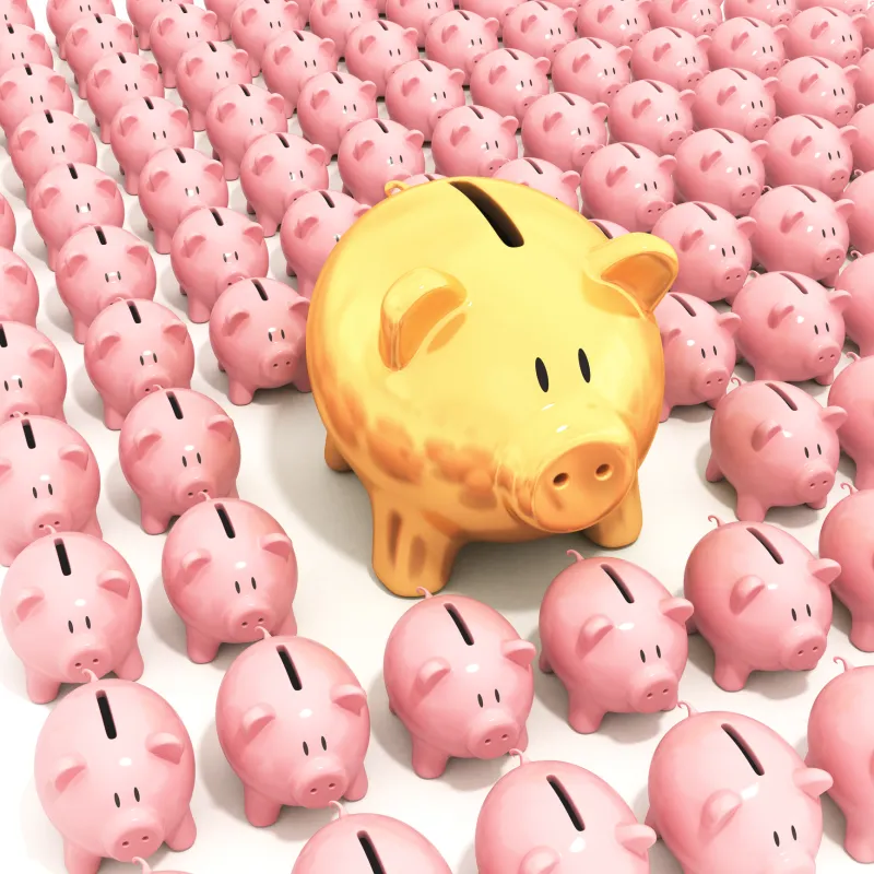 giant golden piggy bank surrounded by smaller, pink piggy banks