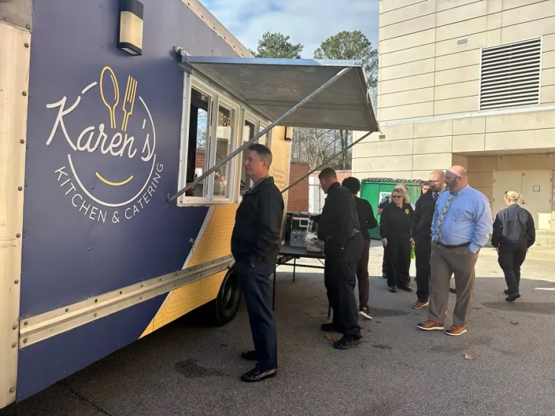 Lexington Police employees waiting in line at Karen's Kitchen Food Truck