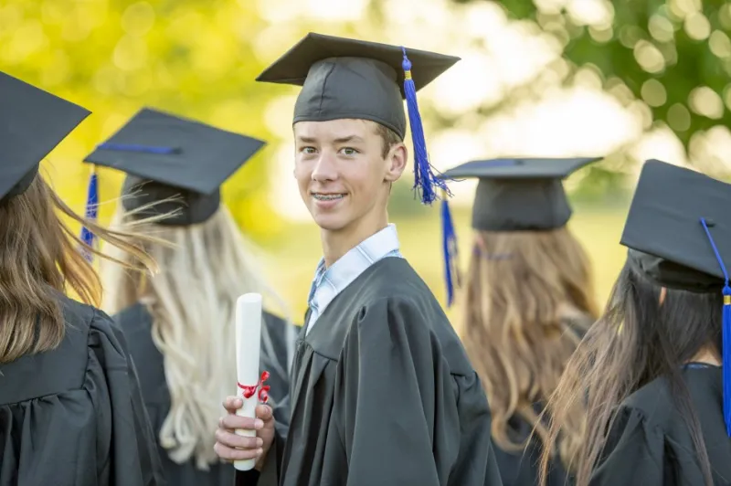 Young Male High School Graduate