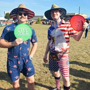 Two men wearing patriotic outfits