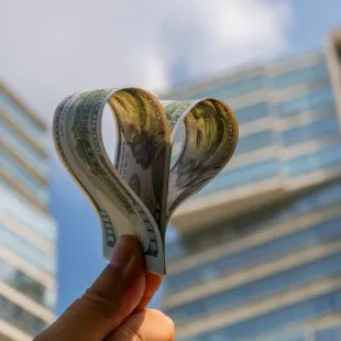money in the shape of a heart