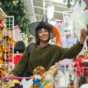 Woman shopping in the fall seasonal aisle