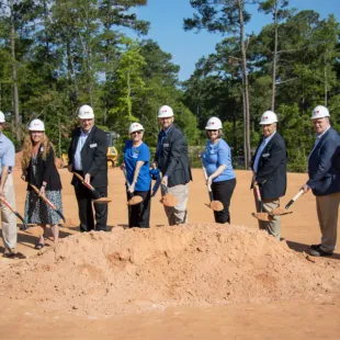 Members of SAFE Federal Credit Union's Executive Team with shovels at the site of its new Irmo branch build.