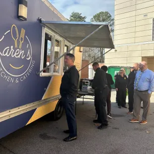 Lexington Police employees waiting in line at Karen's Kitchen Food Truck